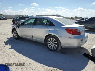 2010 Chrysler Sebring Limited with VIN 1C3CC5FB1AN110588, listed as a Copart auction lot 48318985 with Not Provided miles and Non Repairable. Bid and sale history available at DreamBid. Image 2.