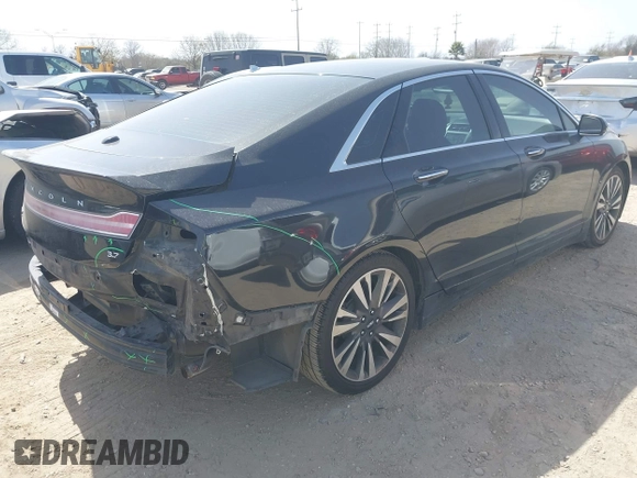 2013 Lincoln MKZ z VIN 3LN6L2GK4DR827120, wystawiony jako IAAI lot #41686914 z przebiegiem 76 114 mil mil oraz . Historia ofert i sprzedaży dostępna na DreamBid. Obrazek 4.