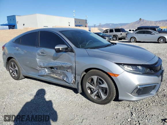 2020 Honda Civic LX with VIN 19XFC2F6XLE205068, listed as a Copart auction lot 46477215 with 58,296 mi miles and Salvage Title. Bid and sale history available at DreamBid. Image 4.