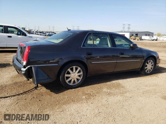 2008 Cadillac DTS 1SC z VIN 1G6KD57Y68U111388, wystawiony jako Copart lot #54204465 z przebiegiem 122 077 mil mil oraz Szkoda całkowita • Salvage title. Historia ofert i sprzedaży dostępna na DreamBid. Obrazek 3.