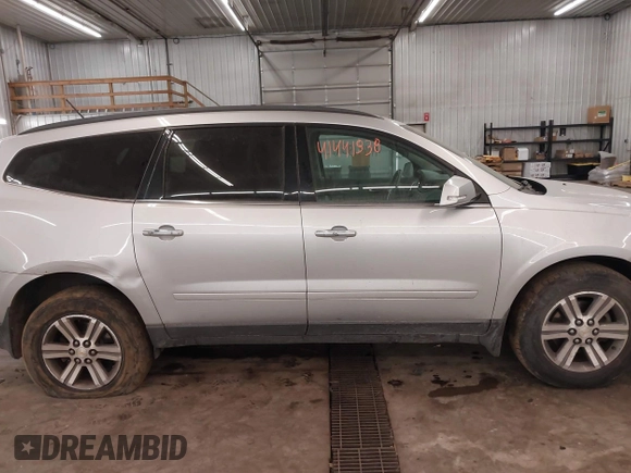 2015 Chevrolet Traverse LT with VIN 1GNKVHKD4FJ305990, listed as a IAAI auction lot 41441938 with 203,877 mi miles and . Bid and sale history available at DreamBid. Image 14.