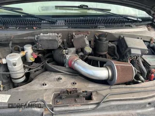 2000 Chevrolet Astro z VIN 1GNDM19W2YB102264, wystawiony jako Copart lot #54593295 z przebiegiem 244 323 mil mil oraz Tytuł czysty. Historia ofert i sprzedaży dostępna na DreamBid. Obrazek 7.