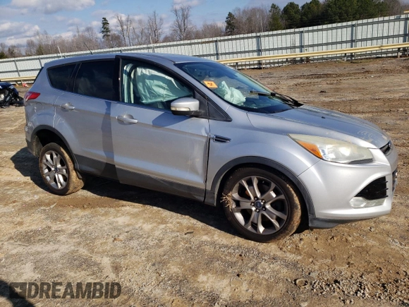 2013 Ford Escape SEL with VIN 1FMCU9HX7DUA60178, listed as a Copart auction lot 85203234 with 144,153 mi miles and Salvage Title. Bid and sale history available at carsss.com. Image 4.
