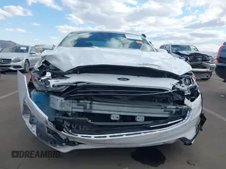 2020 Ford Fusion SE with VIN 3FA6P0HD6LR252987, listed as a IAAI auction lot 42064351 with 63,832 mi miles and . Bid and sale history available at carsss.com. Image 12.