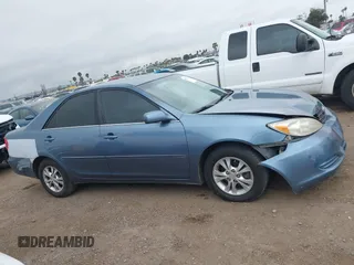 2004 Toyota Camry LE with VIN 4T1BF32K54U572537, listed as a IAAI auction lot 41850322 with 167,076 mi miles and . Bid and sale history available at DreamBid. Image 13.
