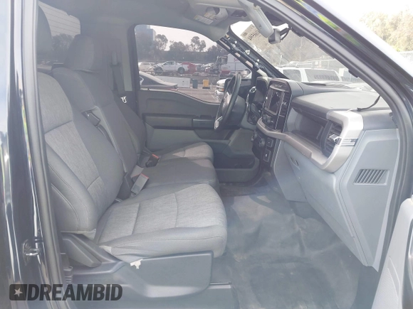 2023 Ford F-150 XL with VIN 1FTMF1C52PKG05729, listed as a IAAI auction lot 41685994 with 12,805 mi miles and . Bid and sale history available at carsss.com. Image 5.