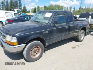 1999 Ford Ranger XL with VIN 1FTZR15V9XPC09651, listed as a IAAI auction lot 42088357 with 247,031 mi miles. Bid and sale history available at carsss.com. Image 2.