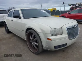 2005 Chrysler 300 with VIN 2C3JA43R75H627448, listed as a IAAI auction lot 41668340 with 171,369 mi miles. Bid and sale history available at carsss.com. Image 1.