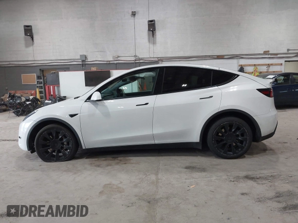 2020 Tesla Model Y Long Range z VIN 5YJYGDEE5LF041935, wystawiony jako IAAI lot #42369750 z przebiegiem 79 540 mil mil oraz . Historia ofert i sprzedaży dostępna na DreamBid. Obrazek 15.