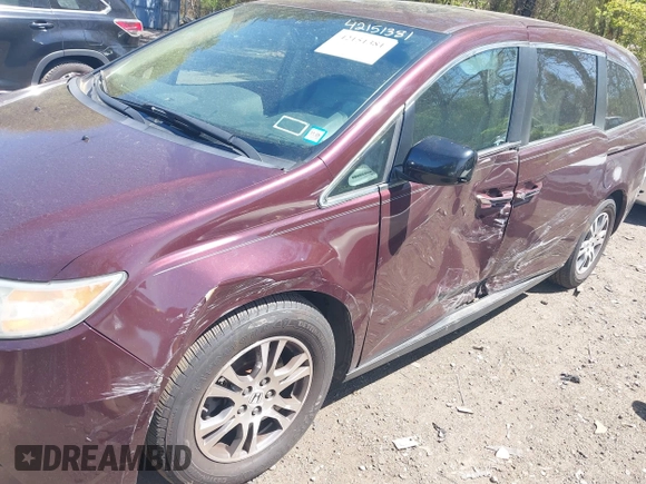 2011 Honda Odyssey EX-L with VIN 5FNRL5H69BB093996, listed as a IAAI auction lot 42151381 with 88,531 mi miles and . Bid and sale history available at carsss.com. Image 6.