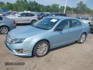 2010 Ford Fusion Hybrid z VIN 3FADP0L35AR279780, wystawiony jako IAAI lot #42480146 z przebiegiem 148 080 mil mil oraz . Historia ofert i sprzedaży dostępna na DreamBid. Obrazek 2.