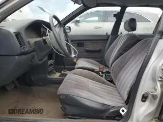 1991 Toyota Corolla z VIN 1NXAE94A8MZ234510, wystawiony jako Copart lot #75002404 z przebiegiem 188 051 mil mil oraz Szkoda całkowita • Salvage title. Historia ofert i sprzedaży dostępna na DreamBid. Obrazek 7.