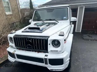 2002 Mercedes-Benz G-Class with VIN WDCYR49E22X132146, listed as a Copart auction lot 87416074 with 208,917 mi miles and Salvage Title. Bid and sale history available at carsss.com. Image 2.