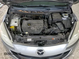 2012 Mazda 5 Touring z VIN JM1CW2CL6C0143536, wystawiony jako Copart lot #57579915 z przebiegiem 148 191 mil mil oraz Szkoda całkowita • Salvage title. Historia ofert i sprzedaży dostępna na DreamBid. Obrazek 12.