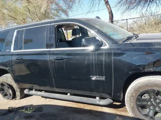 2020 Chevrolet Suburban LT with VIN 1GNSKHKC5LR303081, listed as a IAAI auction lot 41896511 with 60,121 mi miles and . Bid and sale history available at DreamBid. Image 12.