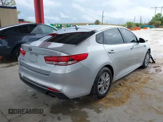 2018 Kia Optima LX z VIN 5XXGT4L3XJG231457, wystawiony jako IAAI lot #42255585 z przebiegiem 75 877 mil mil oraz . Historia ofert i sprzedaży dostępna na DreamBid. Obrazek 4.