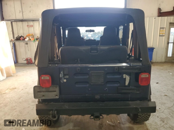 2006 Jeep Wrangler SE with VIN 1J4FA29126P705827, listed as a Copart auction lot 82226674 with 165,632 mi miles and Salvage Title. Bid and sale history available at carsss.com. Image 6.