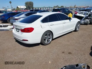 2019 BMW 4 Series 430i with VIN WBA4J1C54KBM18190, listed as a IAAI auction lot 42012759 with 73,598 mi miles. Bid and sale history available at carsss.com. Image 4.