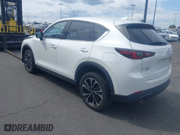 2023 Mazda CX-5 2.5 S Premium Plus Package with VIN JM3KFBEM4P0112803, listed as a IAAI auction lot 41588872 with 25,087 mi miles. Bid and sale history available at carsss.com. Image 3.