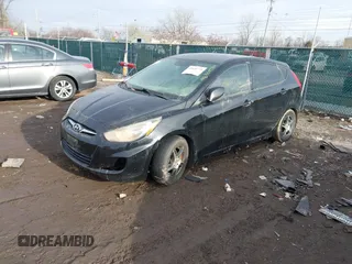 2013 Hyundai Accent GS z VIN KMHCT5AE1DU119732, wystawiony jako IAAI lot #41630775 z przebiegiem 180 001 mil mil oraz . Historia ofert i sprzedaży dostępna na DreamBid. Obrazek 2.