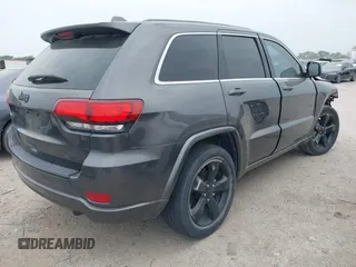 2015 Jeep Grand Cherokee Altitude with VIN 1C4RJEAG3FC219782, listed as a IAAI auction lot 42076212 with 194,910 mi miles. Bid and sale history available at carsss.com. Image 4.