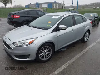 2017 Ford Focus SE with VIN 1FADP3F24HL303600, listed as a IAAI auction lot 41948159 with 95,212 mi miles and . Bid and sale history available at DreamBid. Image 2.