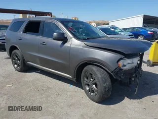 2013 Dodge Durango SXT with VIN 1C4RDJAG5DC697005, listed as a IAAI auction lot 42396872 with 115,046 mi miles and . Bid and sale history available at DreamBid. Image 1.