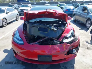 2019 Tesla Model 3 Mid Range с VIN 5YJ3E1EA7KF396485, выставлен на аукционе IAAI как лот 41999619 с пробегом 48 090 миль миль и . История ставок и продаж доступна на DreamBid. Изображение 13.