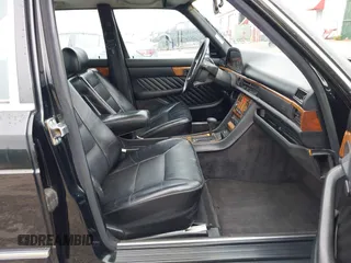 1990 Mercedes-Benz 560 with VIN WDBCA39E4LA534349, listed as a IAAI auction lot 42201056 with 211,470 mi miles and . Bid and sale history available at DreamBid. Image 5.