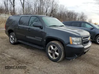 2011 Chevrolet Suburban LT with VIN 1GNSKJE33BR389346, listed as a Copart auction lot 48250195 with 217,815 mi miles and Salvage Title. Bid and sale history available at carsss.com. Image 4.
