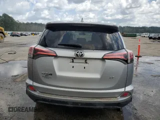 2017 Toyota RAV4 LE with VIN 2T3ZFREV3HW387441, listed as a Copart auction lot 51742245 with 104,823 mi miles and Salvage Title. Bid and sale history available at DreamBid. Image 6.