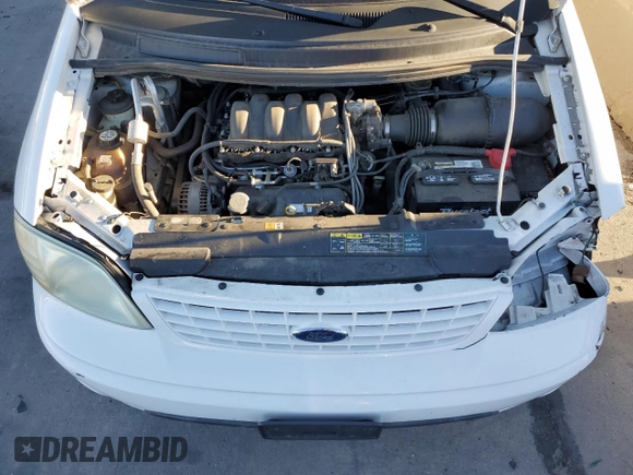 2003 Ford Windstar LX with VIN 2FMZA51493BB24849, listed as a Copart auction lot 76728704 with 156,820 mi miles and Salvage Title. Bid and sale history available at DreamBid. Image 12.