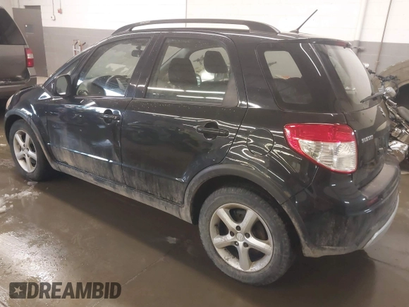 2009 Suzuki SX4 Man AWD with VIN JS2YB413096204911, listed as a IAAI auction lot 41572173 with 84,763 mi miles. Bid and sale history available at carsss.com. Image 3.
