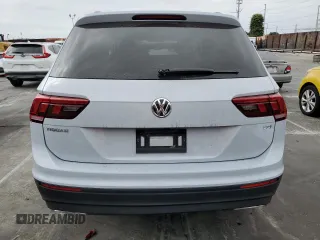 2018 Volkswagen Tiguan S with VIN 3VV1B7AXXJM013468, listed as a Copart auction lot 58371875 with 61,464 mi miles and Salvage title. Bid and sale history available at DreamBid. Image 6.