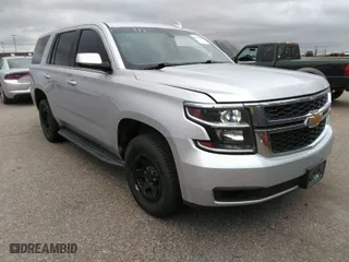 2016 Chevrolet Tahoe Commercial with VIN 1GNSKDEC5GR368328, listed as a IAAI auction lot 41975629 with 104,205 mi miles. Bid and sale history available at carsss.com. Image 1.