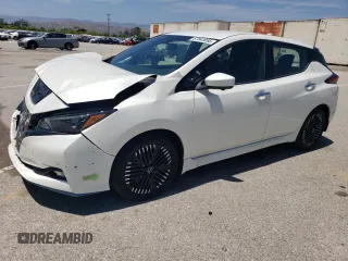 2023 Nissan LEAF SV Plus z VIN 1N4CZ1CV0PC557151, wystawiony jako Copart lot #57843055 z przebiegiem 15 385 mil mil oraz Szkoda całkowita • Salvage title. Historia ofert i sprzedaży dostępna na DreamBid. Obrazek 1.