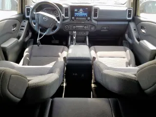 2022 Nissan Frontier Pro-4X with VIN 1N6ED1EK5NN691351, listed as a Copart auction lot 65206915 with 64,610 mi miles and Salvage title. Bid and sale history available at DreamBid. Image 8.