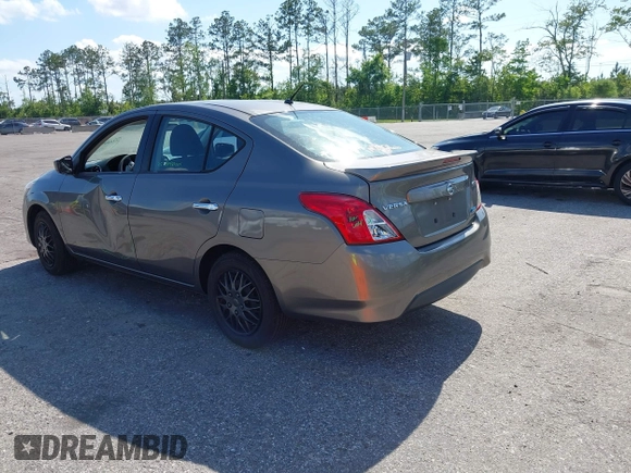 2016 Nissan Versa S Plus with VIN 3N1CN7AP1GL823488, listed as a IAAI auction lot 42060937 with 125,077 mi miles. Bid and sale history available at carsss.com. Image 3.