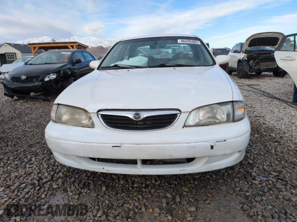 1999 Mazda 626 ES z VIN 1YVGF22C9X5887587, wystawiony jako Copart lot #46346305 z przebiegiem 92 715 mil mil oraz Szkoda całkowita • Salvage title. Historia ofert i sprzedaży dostępna na DreamBid. Obrazek 5.