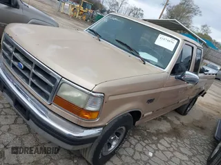 1996 Ford F-150 Special with VIN 1FTEX15N3TKA33031, listed as a IAAI auction lot 41874856 with 350,940 mi miles. Bid and sale history available at carsss.com. Image 2.
