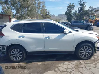2019 Nissan Rogue SV with VIN JN8AT2MT4KW255007, listed as a IAAI auction lot 42066613 with 106,699 mi miles and . Bid and sale history available at DreamBid. Image 14.
