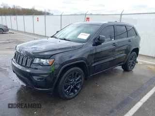 2018 Jeep Grand Cherokee Laredo with VIN 1C4RJFAG7JC468391, listed as a IAAI auction lot 42010443 with 91,585 mi miles and . Bid and sale history available at DreamBid. Image 18.