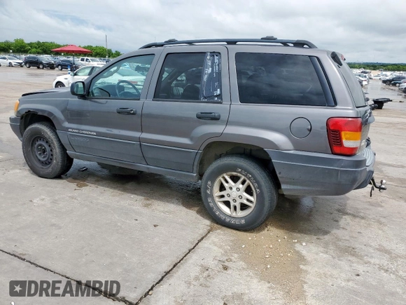 2003 Jeep Grand Cherokee Laredo with VIN 1J4GW48SX3C569087, listed as a Copart auction lot 55941035 with Not provided miles and Salvage title. Bid and sale history available at DreamBid. Image 2.
