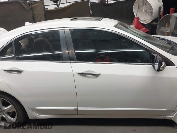 2009 Acura TSX with VIN JH4CU26669C028582, listed as a IAAI auction lot 42074708 with 194,316 mi miles. Bid and sale history available at carsss.com. Image 14.