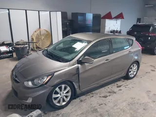 2013 Hyundai Accent SE with VIN KMHCU5AE6DU097353, listed as a IAAI auction lot 41937225 with 173,447 mi miles. Bid and sale history available at carsss.com. Image 17.