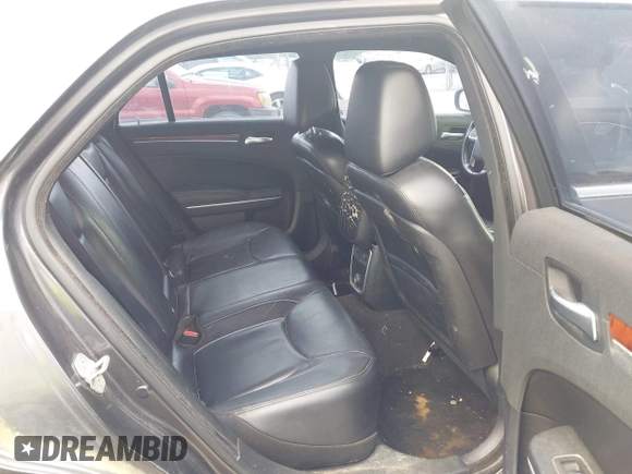 2013 Chrysler 300 with VIN 2C3CCAAG4DH588190, listed as a IAAI auction lot 42476895 with 224,837 mi miles and . Bid and sale history available at DreamBid. Image 8.