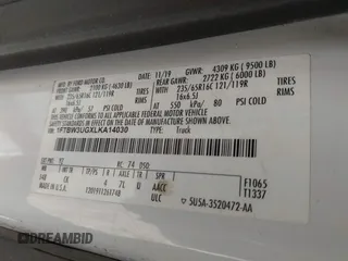 2020 Ford Transit Cargo with VIN 1FTBW3UGXLKA14030, listed as a IAAI auction lot 42505110 with 169,612 mi miles and . Bid and sale history available at DreamBid. Image 9.