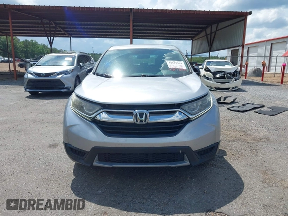 2017 Honda CR-V LX z VIN 7FARW5H36HE003231, wystawiony jako IAAI lot #42172393 z przebiegiem 92 527 mil mil oraz . Historia ofert i sprzedaży dostępna na DreamBid. Obrazek 13.