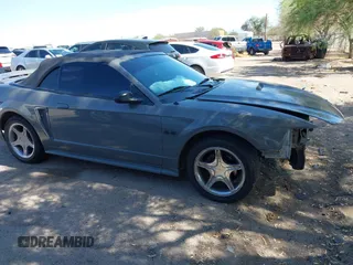 1999 Ford Mustang GT z VIN 1FAFP45X4XF117368, wystawiony jako IAAI lot #42714841 z przebiegiem 135 368 mil mil oraz . Historia ofert i sprzedaży dostępna na DreamBid. Obrazek 14.