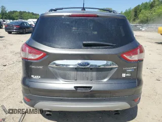 2015 Ford Escape Titanium with VIN 1FMCU9J92FUC74879, listed as a Copart auction lot 54683185 with 143,436 mi miles and Salvage title. Bid and sale history available at DreamBid. Image 6.